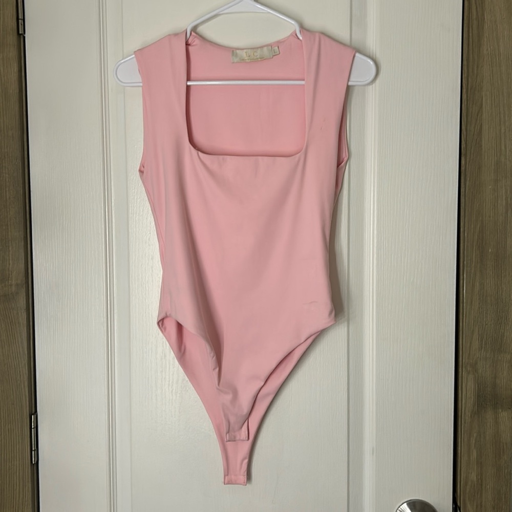 Pink body suit